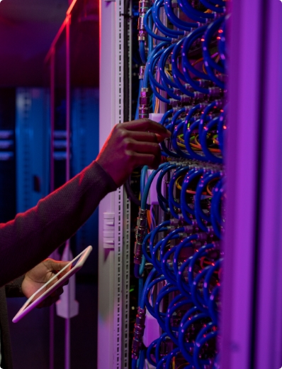 black-man-examining-datacenter-equipment-2023-11-27-04-58-33-utc